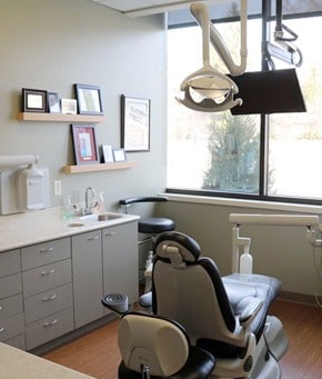 Dental chair with equipment and display screen