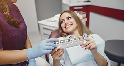 Dentist consulting with a patient